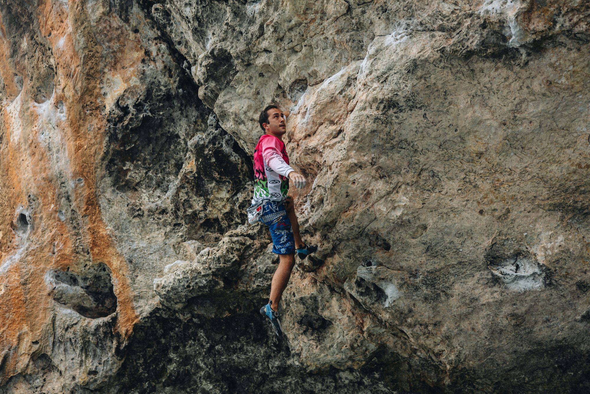 Climber on overhanging limestone 4