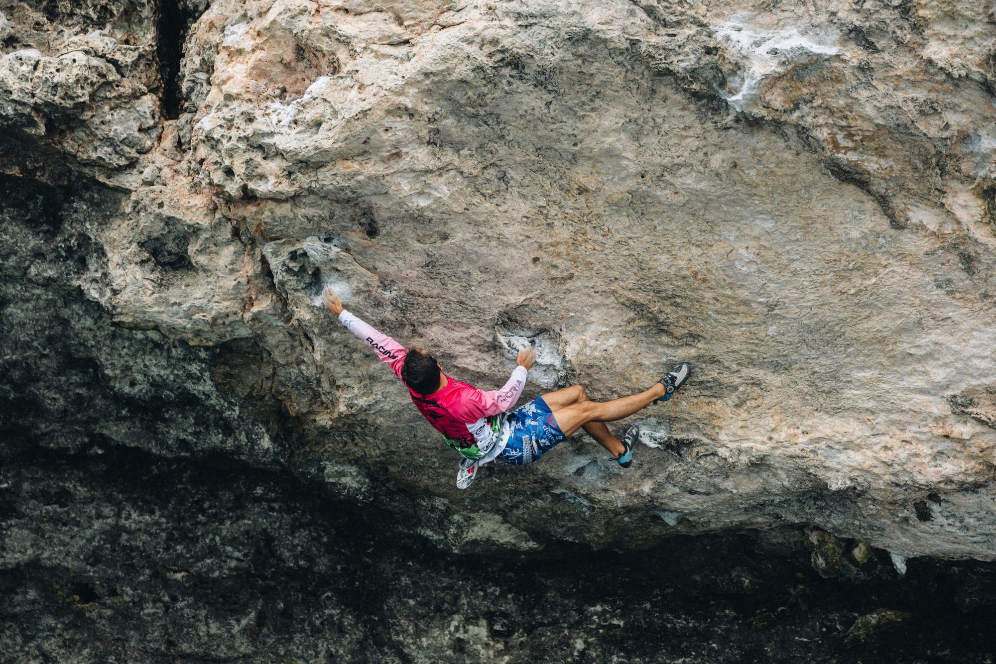 Climber on overhanging limestone 2